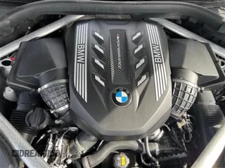 2021 BMW X7 M50i z VIN 5UXCX6C01M9D99785, wystawiony jako Copart lot #59682835 z przebiegiem 21 754 mil mil oraz Szkoda całkowita • Salvage title. Historia ofert i sprzedaży dostępna na DreamBid. Obrazek 7.