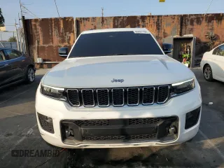 2023 Jeep Grand Cherokee Overland with VIN 1C4RJHDG8PC502208, listed as a Copart auction lot 86927734 with 53,732 mi miles and Salvage title. Bid and sale history available at DreamBid. Image 5.