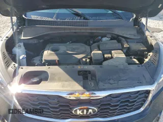 2019 Kia Sorento L z VIN 5XYPG4A31KG585341, wystawiony jako Copart lot #53194145 z przebiegiem 67 451 mil mil oraz Szkoda całkowita • Salvage title. Historia ofert i sprzedaży dostępna na DreamBid. Obrazek 12.