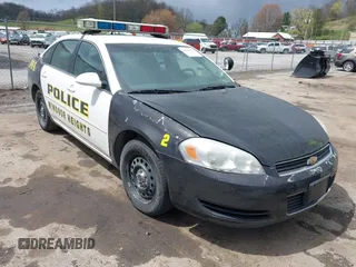 2006 Chevrolet Impala Police Police z VIN 2G1WS551769419411, wystawiony jako IAAI lot #42013349 z przebiegiem 100 587 mil mil oraz . Historia ofert i sprzedaży dostępna na DreamBid. Obrazek 1.