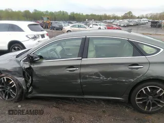 2014 Toyota Avalon Limited with VIN 4T1BK1EBXEU109256, listed as a IAAI auction lot 41908504 with 84,472 mi miles and . Bid and sale history available at DreamBid. Image 13.