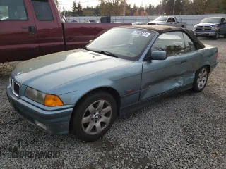 1994 BMW 3 Series 318iC with VIN WBABK532XREC82743, listed as a Copart auction lot 77685874 with 194,919 mi miles and Salvage Title. Bid and sale history available at carsss.com. Image 1.