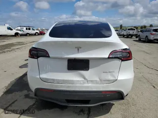 2023 Tesla Model Y Long Range with VIN 7SAYGDEE3PF693316, listed as a Copart auction lot 49501945 with 0 mi miles and Salvage Title. Bid and sale history available at carsss.com. Image 6.