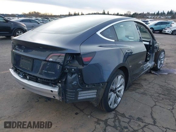 2018 Tesla Model 3 Long Range Battery with VIN 5YJ3E1EB9JF097118, listed as a IAAI auction lot 41619510 with 64,132 mi miles and . Bid and sale history available at DreamBid. Image 4.