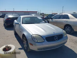 1999 Mercedes-Benz SLK-Class with VIN WDBKK47F9XF125721, listed as a IAAI auction lot 41707565 with 1 mi miles. Bid and sale history available at carsss.com. Image 1.