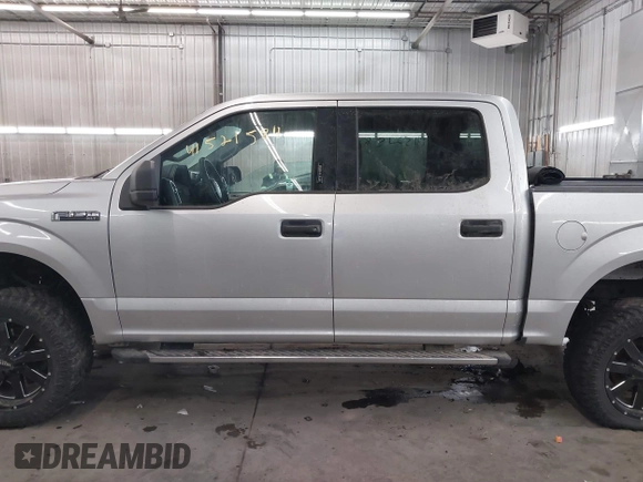2015 Ford F-150 XLT with VIN 1FTEW1E89FFA44710, listed as a IAAI auction lot 41521584 with 158,297 mi miles. Bid and sale history available at carsss.com. Image 15.