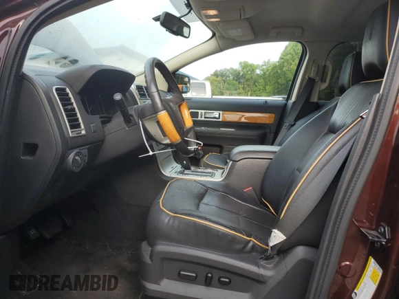 2010 Lincoln MKX with VIN 2LMDJ8JC9ABJ30736, listed as a Copart auction lot 71791594 with 116,083 mi miles and Salvage Title. Bid and sale history available at DreamBid. Image 7.