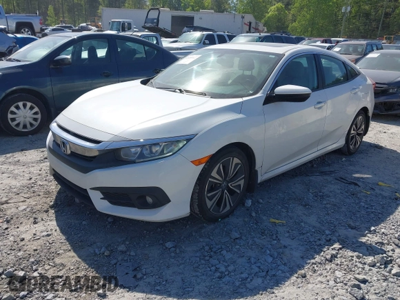 2018 Honda Civic EX-L z VIN 19XFC1F70JE000634, wystawiony jako IAAI lot #42020912 z przebiegiem 156 030 mil mil oraz . Historia ofert i sprzedaży dostępna na DreamBid. Obrazek 17.