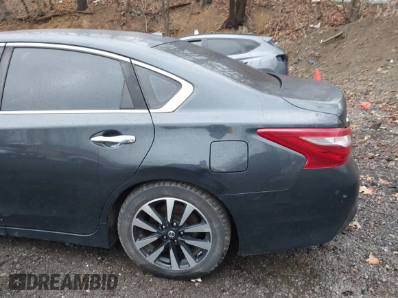 2018 Nissan Altima SV with VIN 1N4AL3AP3JC205875, listed as a IAAI auction lot 41892855 with 159,630 mi miles and . Bid and sale history available at DreamBid. Image 12.