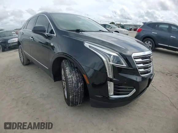 2017 Cadillac XT5 Luxury FWD with VIN 1GYKNBRS3HZ101867, listed as a Copart auction lot 60923215 with 130,209 mi miles and Salvage title. Bid and sale history available at DreamBid. Image 15.