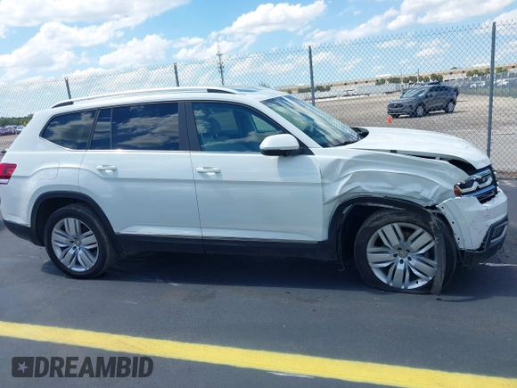 2019 Volkswagen Atlas SEL with VIN 1V2MR2CA7KC557754, listed as a IAAI auction lot 42264080 with 20,412 mi miles and . Bid and sale history available at DreamBid. Image 13.