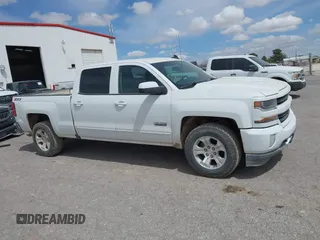 2018 Chevrolet Silverado 1500 LT with VIN 1GCUKREC5JF133998, listed as a IAAI auction lot 41880805 with 166,258 mi miles and . Bid and sale history available at DreamBid. Image 13.