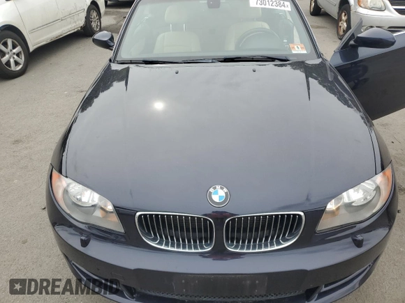 2009 BMW 1 Series 128i with VIN WBAUN13559VH80948, listed as a Copart auction lot 73012384 with 130,694 mi miles and Clean Title. Bid and sale history available at carsss.com. Image 11.