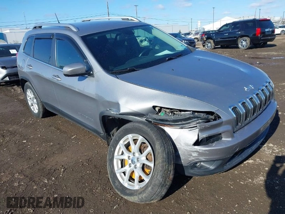 2014 Jeep Cherokee Latitude with VIN 1C4PJMCBXEW107559, listed as a IAAI auction lot 41859246 with 94,812 mi miles and . Bid and sale history available at DreamBid. Image 1.
