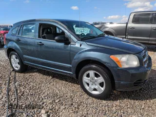 2008 Dodge Caliber SXT with VIN 1B3HB48B58D582130, listed as a Copart auction lot 49707155 with 155,347 mi miles and Salvage Title. Bid and sale history available at DreamBid. Image 4.
