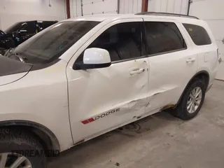 2014 Dodge Durango SXT z VIN 1C4RDJAG5EC476294, wystawiony jako IAAI lot #41901092 z przebiegiem 195 293 mil mil oraz . Historia ofert i sprzedaży dostępna na DreamBid. Obrazek 6.