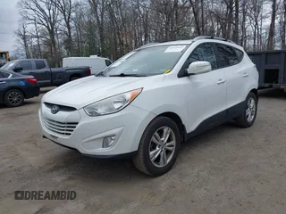 2013 Hyundai Tucson GLS with VIN KM8JU3AC5DU693550, listed as a IAAI auction lot 41919615 with 202,517 mi miles. Bid and sale history available at carsss.com. Image 2.