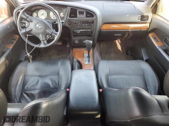 2003 Nissan Pathfinder LE with VIN JN8DR09Y83W831073, listed as a Copart auction lot 62382265 with 94,596 mi miles and Salvage title. Bid and sale history available at DreamBid. Image 8.