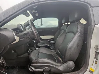 2015 MINI Coupe S z VIN WMWSX3C51FT409464, wystawiony jako Copart lot #60761415 z przebiegiem Nie podano mil oraz Czysty tytuł • Clean title. Historia ofert i sprzedaży dostępna na DreamBid. Obrazek 7.