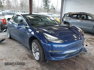 2018 Tesla Model 3 Long Range Battery z VIN 5YJ3E1EA7JF035949, wystawiony jako IAAI lot #41627027 z przebiegiem Nie podano mil oraz . Historia ofert i sprzedaży dostępna na DreamBid. Obrazek 1.