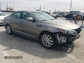 2015 Kia Optima EX with VIN 5XXGN4A78FG357176, listed as a Copart auction lot 52031985 with 99,372 mi miles and Salvage Title. Bid and sale history available at carsss.com. Image 4.