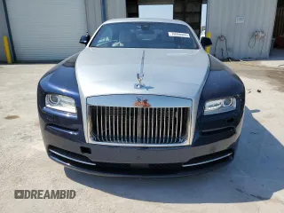 2014 Rolls-Royce Wraith z VIN SCA665C58EUX84660, wystawiony jako Copart lot #76050444 z przebiegiem 46 271 mil mil oraz Szkody całkowita. Historia ofert i sprzedaży dostępna na DreamBid. Obrazek 5.