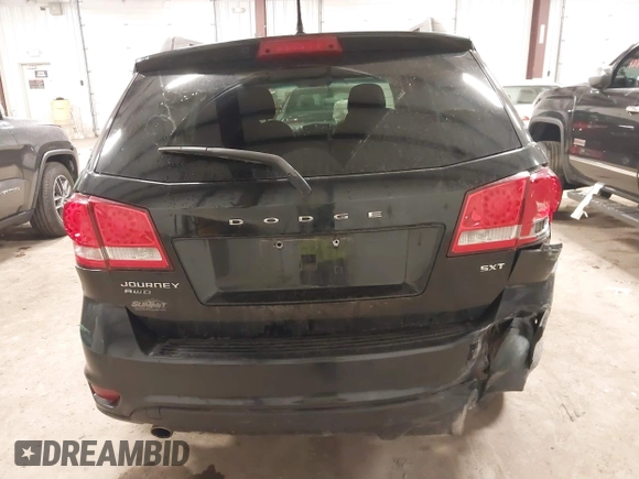 2013 Dodge Journey SXT with VIN 3C4PDDBGXDT571489, listed as a IAAI auction lot 42015939 with 206,550 mi miles and . Bid and sale history available at DreamBid. Image 16.
