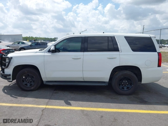 2016 Chevrolet Tahoe Commercial with VIN 1GNLCDEC5GR423300, listed as a IAAI auction lot 41967399 with 147,429 mi miles. Bid and sale history available at carsss.com. Image 14.