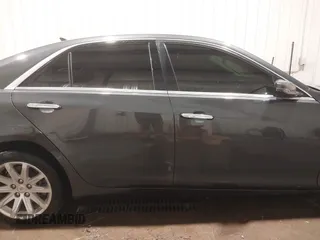 2014 Cadillac CTS Luxury AWD with VIN 1G6AX5S37E0172041, listed as a IAAI auction lot 40343343 with 102,506 mi miles and . Bid and sale history available at DreamBid. Image 13.