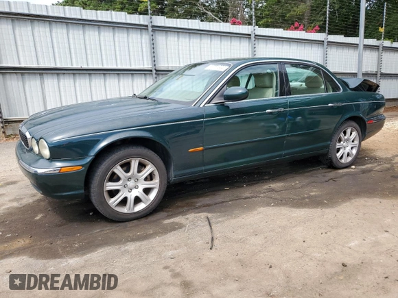 2004 Jaguar XJ with VIN SAJWA71C34SG16508, listed as a Copart auction lot 66751644 with 179,039 mi miles and Salvage Title. Bid and sale history available at carsss.com. Image 1.