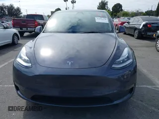 2021 Tesla Model Y Long Range with VIN 5YJYGDEE6MF209034, listed as a IAAI auction lot 41896238 with 53,401 mi miles. Bid and sale history available at carsss.com. Image 13.