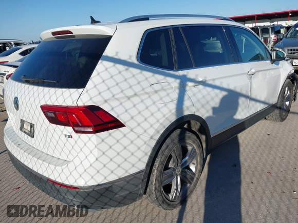 2018 Volkswagen Tiguan SEL Premium with VIN 3VV5B7AX2JM202908, listed as a IAAI auction lot 41137619 with 84,323 mi miles and . Bid and sale history available at DreamBid. Image 4.