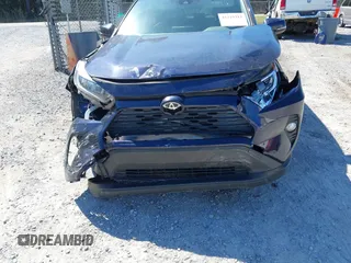 2021 Toyota RAV4 XLE with VIN JTMW1RFV9MD070870, listed as a IAAI auction lot 41719312 with 576,675 mi miles. Bid and sale history available at carsss.com. Image 17.