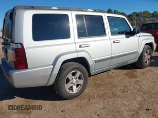 2007 Jeep Commander Sport z VIN 1J8HH48K77C587615, wystawiony jako IAAI lot #41149777 z przebiegiem 167 871 mil mil oraz . Historia ofert i sprzedaży dostępna na DreamBid. Obrazek 4.