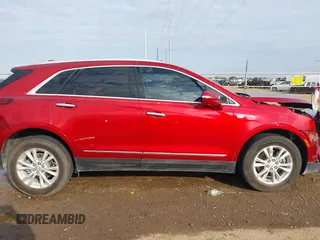 2021 Cadillac XT5 FWD Luxury with VIN 1GYKNAR45MZ125383, listed as a IAAI auction lot 41685947 with 64,997 mi miles. Bid and sale history available at carsss.com. Image 14.