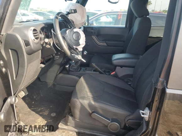2016 Jeep Wrangler Black Bear with VIN 1C4AJWAG3GL152279, listed as a Copart auction lot 62551615 with 50,756 mi miles and Clean title. Bid and sale history available at DreamBid. Image 7.
