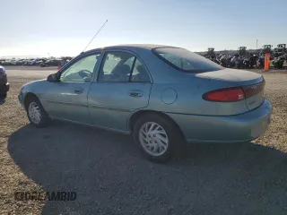 1999 Ford Escort SE with VIN 1FAFP13P5XW177449, listed as a Copart auction lot 82600344 with 237,019 mi miles and Salvage Title. Bid and sale history available at carsss.com. Image 2.