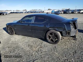 2006 Dodge Charger SRT-8 with VIN 2B3LA73W76H336981, listed as a Copart auction lot 41524535 with 102,915 mi miles and Salvage Title. Bid and sale history available at DreamBid. Image 2.