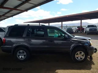2003 Honda Pilot EX with VIN 2HKYF185X3H528255, listed as a IAAI auction lot 41686159 with 261,283 mi miles. Bid and sale history available at carsss.com. Image 13.