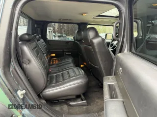 2005 Hummer H2 z VIN 5GRGN22U85107767, wystawiony jako Copart lot #56570325 z przebiegiem 197 076 mil mil oraz Tytuł czysty. Historia ofert i sprzedaży dostępna na DreamBid. Obrazek 6.