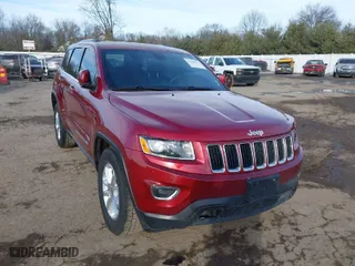 2015 Jeep Grand Cherokee Altitude with VIN 1C4RJFAG4FC626130, listed as a IAAI auction lot 41405767 with 131,069 mi miles. Bid and sale history available at carsss.com. Image 1.