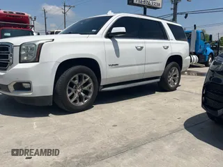 2015 GMC Yukon SLE with VIN 1GKS1AKCXFR513784, listed as a Copart auction lot 54203395 with 219,112 mi miles and Clean Title. Bid and sale history available at carsss.com. Image 2.