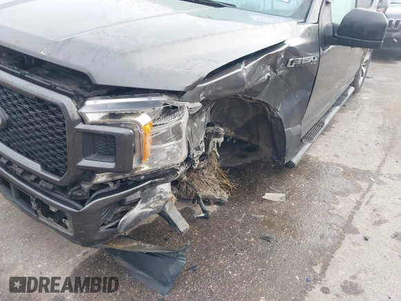 2019 Ford F-150 XL with VIN 1FTEW1CP7KKD80786, listed as a IAAI auction lot 41117065 with 142,011 mi miles and . Bid and sale history available at DreamBid. Image 6.