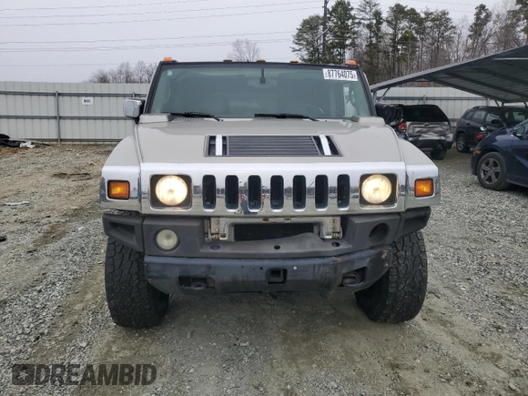 2004 Hummer H2 with VIN 5GRGN23U24H118230, listed as a Copart auction lot 87764075 with 202,206 mi miles and Salvage Title. Bid and sale history available at carsss.com. Image 5.