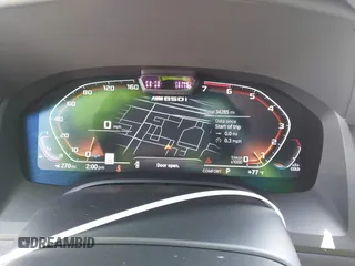 2022 BMW 8 Series M850i z VIN WBAGV8C02NCH87808, wystawiony jako IAAI lot #42255995 z przebiegiem 34 285 mil mil oraz . Historia ofert i sprzedaży dostępna na DreamBid. Obrazek 7.