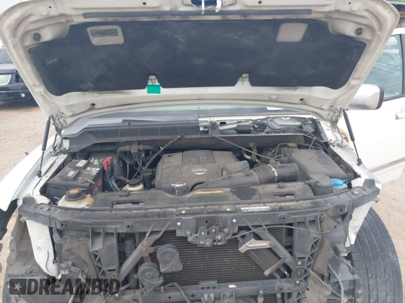 2015 Nissan Armada SV z VIN 5N1BA0ND5FN600845, wystawiony jako IAAI lot #41531206 z przebiegiem 185 476 mil mil oraz . Historia ofert i sprzedaży dostępna na DreamBid. Obrazek 10.