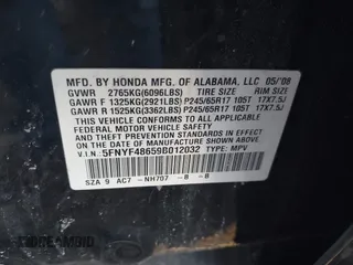 2009 Honda Pilot EX-L with VIN 5FNYF48659B012032, listed as a IAAI auction lot 41801232 with 205,636 mi miles and . Bid and sale history available at carsss.com. Image 9.