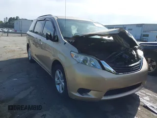 2013 Toyota Sienna LE AAS with VIN 5TDKK3DC1DS299462, listed as a IAAI auction lot 42062921 with 96,762 mi miles and . Bid and sale history available at DreamBid. Image 1.