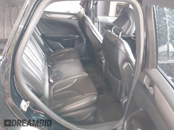 2018 Lincoln MKC Premiere with VIN 5LMCJ1C92JUL19090, listed as a IAAI auction lot 41836181 with 302,120 mi miles and . Bid and sale history available at DreamBid. Image 8.