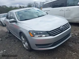 2014 Volkswagen Passat SE w/Sunroof with VIN 1VWBS7A31EC061154, listed as a IAAI auction lot 41729960 with 122,904 mi miles. Bid and sale history available at carsss.com. Image 1.